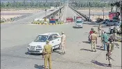  ?? PTI ?? Police check vehicles at Sidra in Jammu during the nationwide lockdown on Saturday.