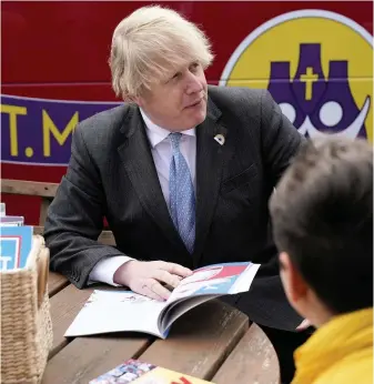  ??  ?? SCHOOL DAY: Boris Johnson at St Mary’s CE Primary School in Tunstall yesterday. Fully reopening schools is part of the Government’s ‘roadmap’ out of lockdown.