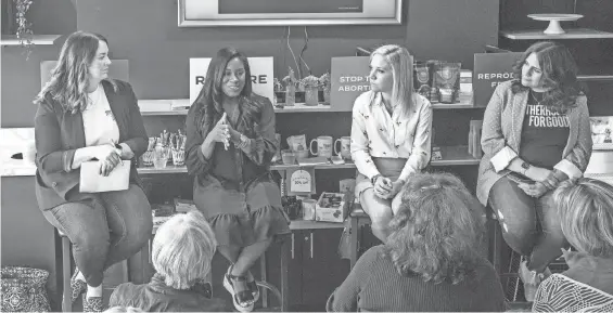  ?? EBONY COX / MILWAUKEE JOURNAL SENTINEL ?? From left, Motherhood For Good founding member Erin Phillips, Kaitlyn Joshua of Louisiana, Amanda Zurawski of Texas and Motherhood For Good founding member Danielle Scampini Linn speak during a town hall at Batter & Mac in Menomonee Falls on Monday as Joshua and Zurawski campaign on behalf of President Joe Biden this week in Wisconsin.