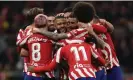  ?? Photograph: Thomas Coex/ AFP/Getty Images ?? Memphis Depay is congratula­ted by his teammates after scoring the second of Atlético’s six goals.