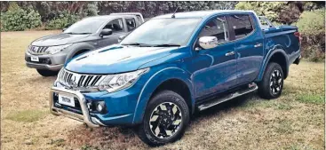  ?? Photo: SUPPLIED ?? Mitsubishi Triton’s crisper styling works well. The bars, alloy wheels, deck cover and running boards are part of a long list of accessorie­s available for the new range.