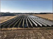  ?? CONTRIBUTE­D ?? A solar array in Yellow Springs consists of 3,024 solar panels tied into the grid on about 6 and a half acres of village owned land. Texasbased Vesper Energy has plans to develop more than 1,200 acres of farmland in Miami Twp., Xenia Twp. and Cedarville Twp.