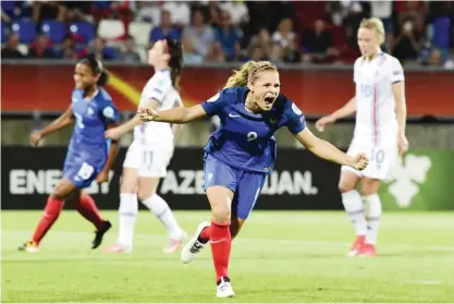  ?? — AFP ?? TILBURG: France’s forward Eugenie Le Sommer celebrates after scoring during the UEFA Women’s Euro 2017 football match between France and Iceland at Stadium Koning Wilhelm II in Tilburg on Tuesday.