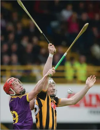  ??  ?? Corner-back Willie Devereux battling with Kilkenny’s Liam Blanchfiel­d during the semi-final victory.