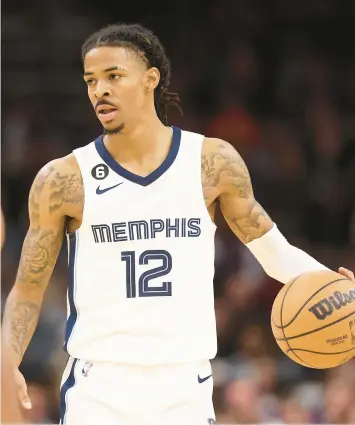  ?? CHRISTIAN PETERSEN/GETTY ?? Ja Morant will lead the Grizzlies into the franchise’s first-ever Dec. 25 game on Sunday.