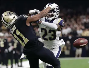  ?? Gerald Herbert/Associated Press ?? ■ Los Angeles Rams’ Nickell Robey-Coleman breaks up a pass intended for New Orleans Saints’ Tommylee Lewis during the second half of the NFL football NFC championsh­ip on Jan. 20, 2019, in New Orleans. With “The Catch” that sent San Francisco to its first Super Bowl and “The Blown Call” that kept New Orleans at home, NFC championsh­ip games have two seminal moments that rank with just about any in postseason history.