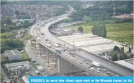  ??  ?? BRUSSELS: An aerial view shows repair work on the Vilvoorde viaduct on the ring road in Brussels.