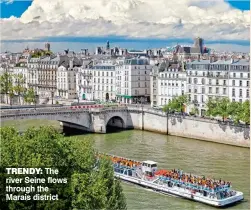  ??  ?? trendy: The river Seine flows through the Marais district