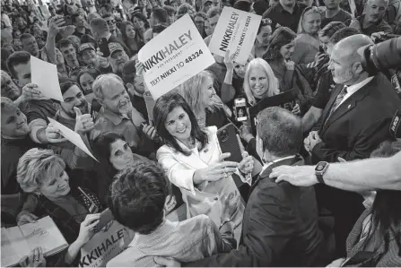  ?? Win Mcnamee/tribune News Service ?? Republican presidenti­al candidate Nikki Haley greets supporters in South Carolina in February. Haley clearly wants to capture the base that yearns for Trumpism — and to occupy the moral high ground of the post-trump era.