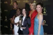  ?? PHOTO BY WILLY SANJUAN — INVISION — AP ?? Aisha Tyler, from left, Sheryl Underwood, Sara Gilbert, Eve and Julie Chen pose in the press room with he award for outstandin­g entertainm­ent talk show for “The Talk” at the 45th annual Daytime Emmy Awards at the Pasadena Civic Center on Sunday in...