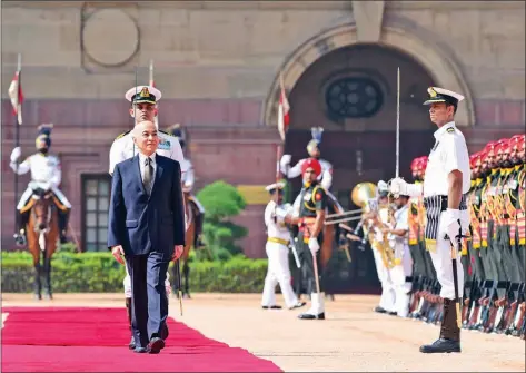  ?? INDIAN PRESIDENTI­AL OFFICE ?? King Norodom Sihamoni walks past an honour guard at the forecourt of the Rashtrapat­i Bhavan presidenti­al palace on May 30 during his state visit to India from May 29-31.