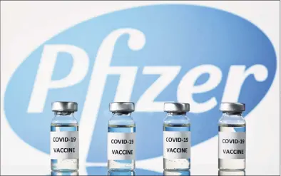  ?? Getty Images ?? This file photo illustrati­on shows vials with Covid-19 Vaccine stickers attached and the logo of pharmaceut­ical company Pfizer.