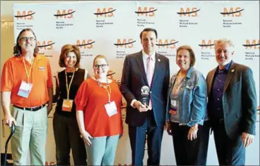  ?? SUBMITTED PHOTO ?? U.S. Rep. Ryan Costello, R-6th Dist., stands with Pennsylvan­ians, including constituen­ts Karen Kovnat and Sandy Carter, at the MS Society Conference.