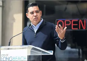  ?? PHOTOS BY BRITTANY MURRAY STAFF PHOTOGRAPH­ER ?? Long Beach Mayor Robert Garcia, here at a press conference Thursday, said that starting April 1, the city will look “at outdoor live events that may occur” with limited attendance.