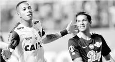  ??  ?? Robinho (left) of Atletico Mineiro celebrates after scoring a goal during the Copa Libertador­es match against Paraguay’s Libertad at Independen­cia stadium in Belo Horizonte, Brazil in this April 26 file photo. — Reuters photo