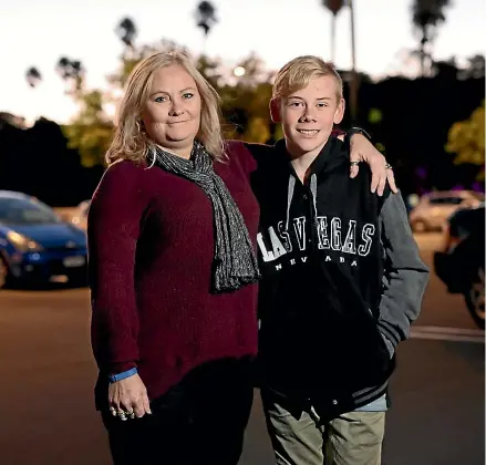  ?? JOHN COWPLAND/STUFF ?? Tania Thomson and her 14-year-old son Jack. The pair finally found a home in Napier’s Awatoto suburb, after applying for more than 100 rental properties over a year.