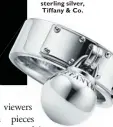  ??  ?? Tiffany HardWear ball dangle ring in sterling silver, Tiffany & Co.