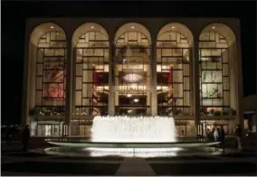  ?? JONATHAN TICHLER/METROPOLIT­AN OPERA VIA AP ?? This 2009image released by the Metropolit­an Opera shows The Metropolit­an Opera House at Lincoln Center Plaza in New York. The financiall­y troubled Metropolit­an Opera says it projects to break even for the 2016-17season. Met general manager Peter Gelb...