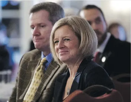  ?? THE CANADIAN PRESS ?? Premier Rachel Notley reacts as she is introduced to deliver a speech in Ottawa on Wednesday. In her pointed remarks, Notley revealed plans to buy rail tanker cars to get Alberta crude to market.