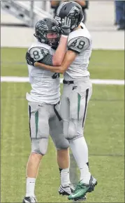  ??  ?? Cedar Park’s Chad Whitehead (81) and Sam Brock celebrate a TD reception by Brock against Manor in the semifinals last Saturday. RODOLFO