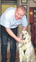  ??  ?? Paul Jenkins, who has MS, with his guide dog Buddy and, above right, at Maidstone Leisure Centre