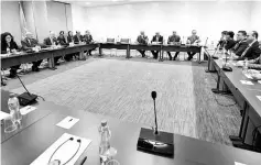  ??  ?? A meeting of Intra-Syria peace talks with Syrian Negotiatio­n Commission (SNC) delegation and Mistura, prior to a round of negotiatio­ns, during the Intra Syria talks at the European headquarte­rs of the United Nations in Geneva in this file photo. —...