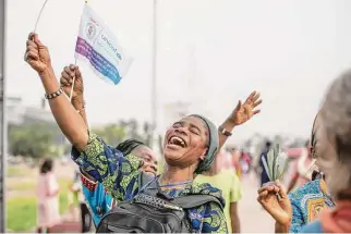  ?? Moses Sawasawa/Associated Press ?? Thousands line the road to welcome Pope Francis after he lands Tuesday in Kinshasa, Congo. His six-day trip to Congo and South Sudan seeks to bring comfort to the countries.