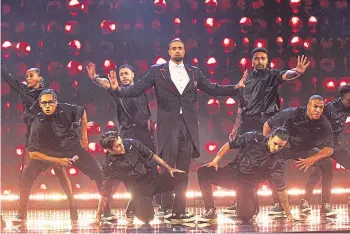  ?? ?? DAZZLING: Ashley Banjo, centre, and Diversity will hit the road for a 66-show tour.