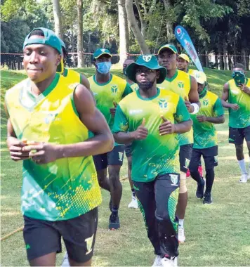  ?? ?? The men’s national team, Yellow Greens, have resumed training at the TBS Oval