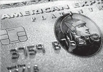  ?? AP/FILE ?? American Express occasional­ly makes a rare offer for some who sign up for its Platinum Card: a 100,000-point bonus.