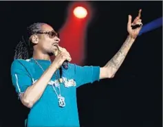  ??  ?? SNOOP DOGG took fans all the way back to 1993 with a spirited, songby-song performanc­e of his mega-smash debut album, “Doggystyle.”
