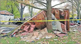  ?? [BARBARA J. PERENIC/DISPATCH] ?? This is what was left after this house in Madison Township exploded early Monday morning, apparently from a gas leak. Homeowner Stewart Bell was released from the hospital Tuesday. His girlfriend, Shelly Williams, died in the blast.