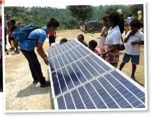  ??  ?? A BRIGHTER FUTURE Australian Ambassador Amanda Gorely poses with the indigenous community in Tarlac. The Australian Embassy funded a workshop facility the IPs now call “Amanda’s Room”; (inset) The solar panels are brought to the indigenous communitie­s