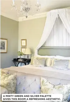  ??  ?? A MINTY GREEN AND SILVER PALETTE GIVES THIS ROOM A REFRESHING AESTHETIC.