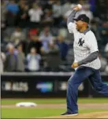 ?? KATHY WILLENS — THE ASSOCIATED PRESS ?? Former New York Yankees pitcher Mariano Rivera throws out the ceremonial first pitch before Game 4 of baseball’s American League Division Series between the New York Yankees and the Cleveland Indians, Monday in New York. The contest was not completed...