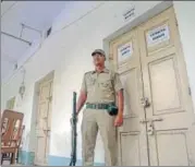  ?? PTI ?? A security guard in front of a strong room after the panchayat poll at Nadia district in West Bengal on Tuesday.