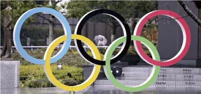  ?? Yomiuri Shimbun file photo ?? A statue of an Olympic logo in Tokyo in 2021