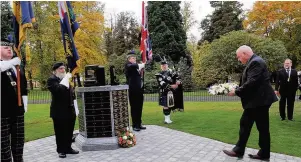  ??  ?? Poignant Wreaths were laid to remember the fallen