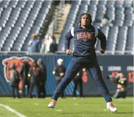  ?? STACEY WESCOTT/CHICAGO TRIBUNE ?? Running back Khalil Herbert warms up before the Bears’ game against the Dolphins at Soldier Field on Nov. 6.