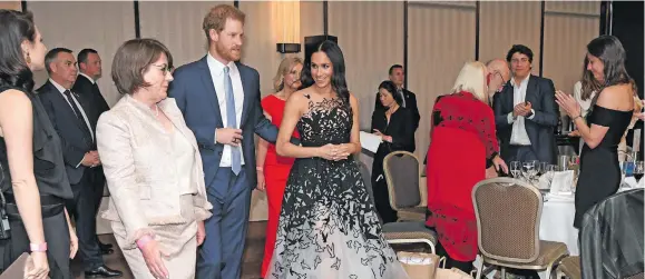  ??  ?? The Duke and Duchess of Sussex attend the Geographic Society awards dinner in Sydney on October 26, 2018.