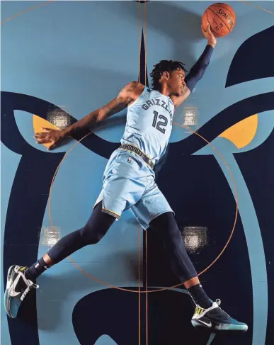  ?? JOE RONDONE / THE COMMERCIAL APPEAL ?? Grizzlies guard Ja Morant poses during the team's media day Monday.