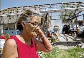  ?? RESHMA KIRPALANI / AMERICAN-STATESMAN ?? Severita Hernandez tries to salvage items from her storage shed, which was ripped apart by Hurricane Harvey in late August. A spokesman for Gov. Greg Abbott said the governor will hold House leadership to the promise of more relief funding on behalf of...