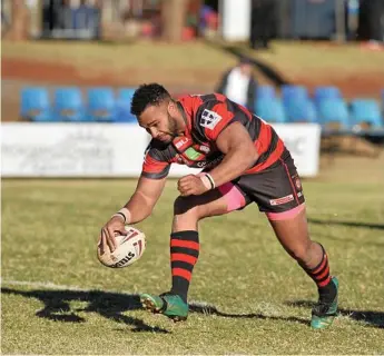  ?? Photos: Kevin Farmer ?? PUSHING CLEAR: Hnaloan Budden extends the Valleys Roosters lead during their win over Dalby in the qualifying final at Glenholme Park.