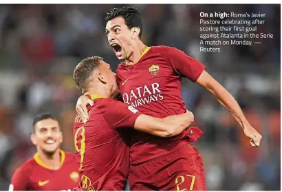  ??  ?? On a high: Roma’s Javier Pastore celebratin­g after scoring their first goal against Atalanta in the Serie A match on Monday. — Reuters