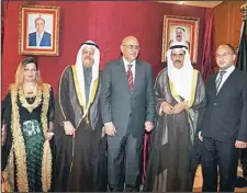  ?? KUNA photo ?? Ambassador Fahad Sa’ad Al-Mi’a poses with invited guests at a function in
Sana’a, Yemen to celebrate Kuwait’s national occasions.