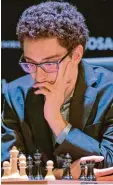 ?? Foto: dpa ?? Fabiano Caruana, ein Amerikaner mit italienisc­hen Wurzeln, gewann das Berli ner Kandidaten­turnier.