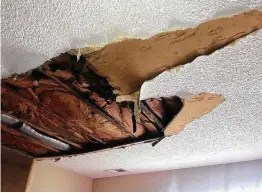  ?? HUD inspection photo obtained through FOIA ?? Inspectors from the Department of Housing and Urban Developmen­t photograph­ed ceilings falling apart at Englewood Apartments.