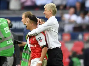  ??  ?? Wenger says he is confident Sanchez will remain an Arsenal player (Getty)