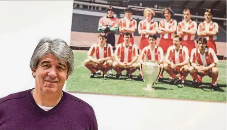  ?? — AFP ?? Former red star Belgrade goalkeeper stevan stojanovic poses next to his 1991 team picture in Belgrade, 25 years after the red star Belgrade European Cup final, an apotheosis of yugoslav football before the country’s bloody collapse.