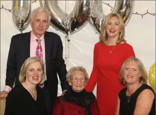  ??  ?? Nancy Bond, who turns 100 on Christmas Day, pictured with relatives Caroline Hogan, Catriona Hogan, Ciaran Hogan and Ciara Waugh at Valentia Nursing Home in Camolin.